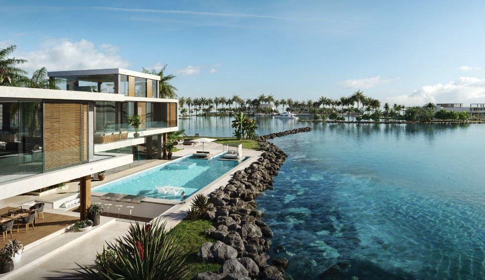 Elegant waterfront villa at Al Gurm Villas with a private swimming pool, Arabian Gulf access, and thoughtfully designed sustainable coastal living.